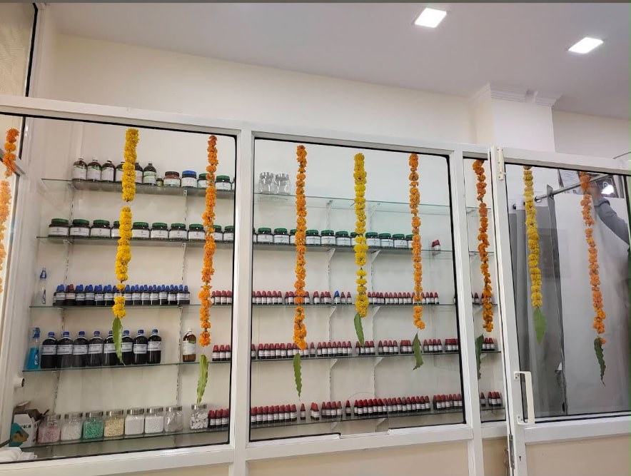 In-house homoeopathic pharmacy shelves at the clinic